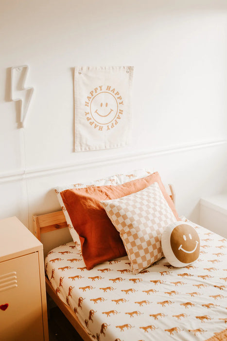 Imani Collective: "Happy" smiley face banner